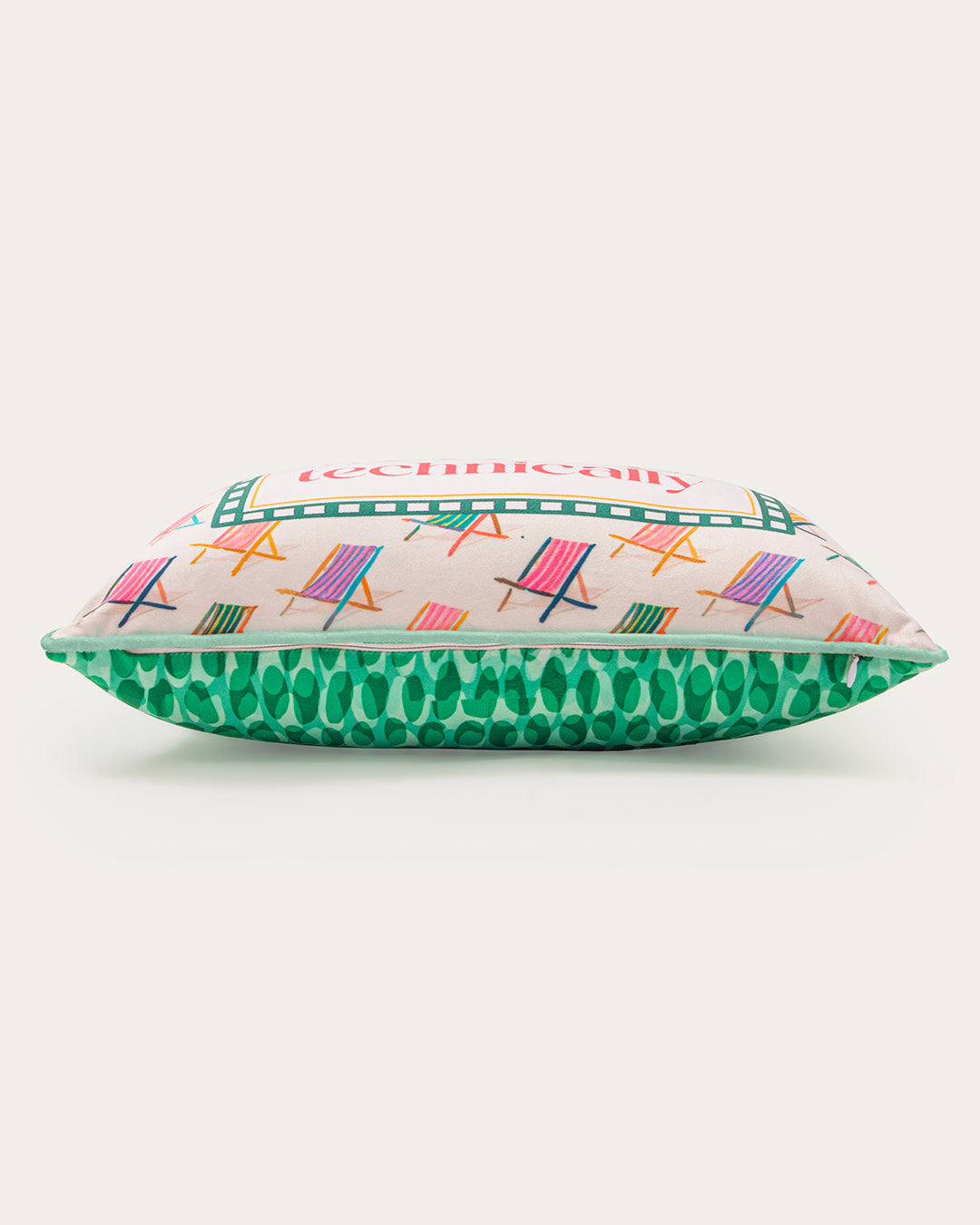 Pillow with colorful deck chairs design on a white background